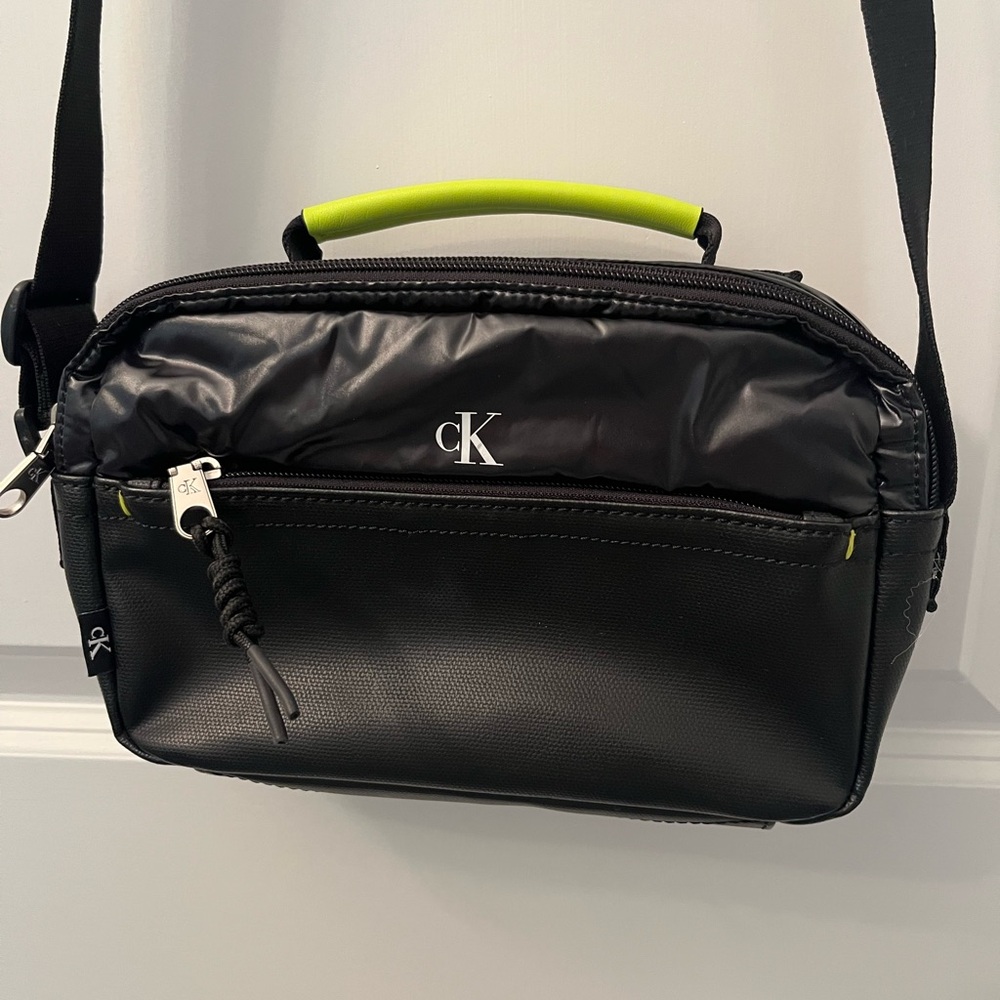Unique Calvin Klein Black crossbody Bag with Neon Green Handle